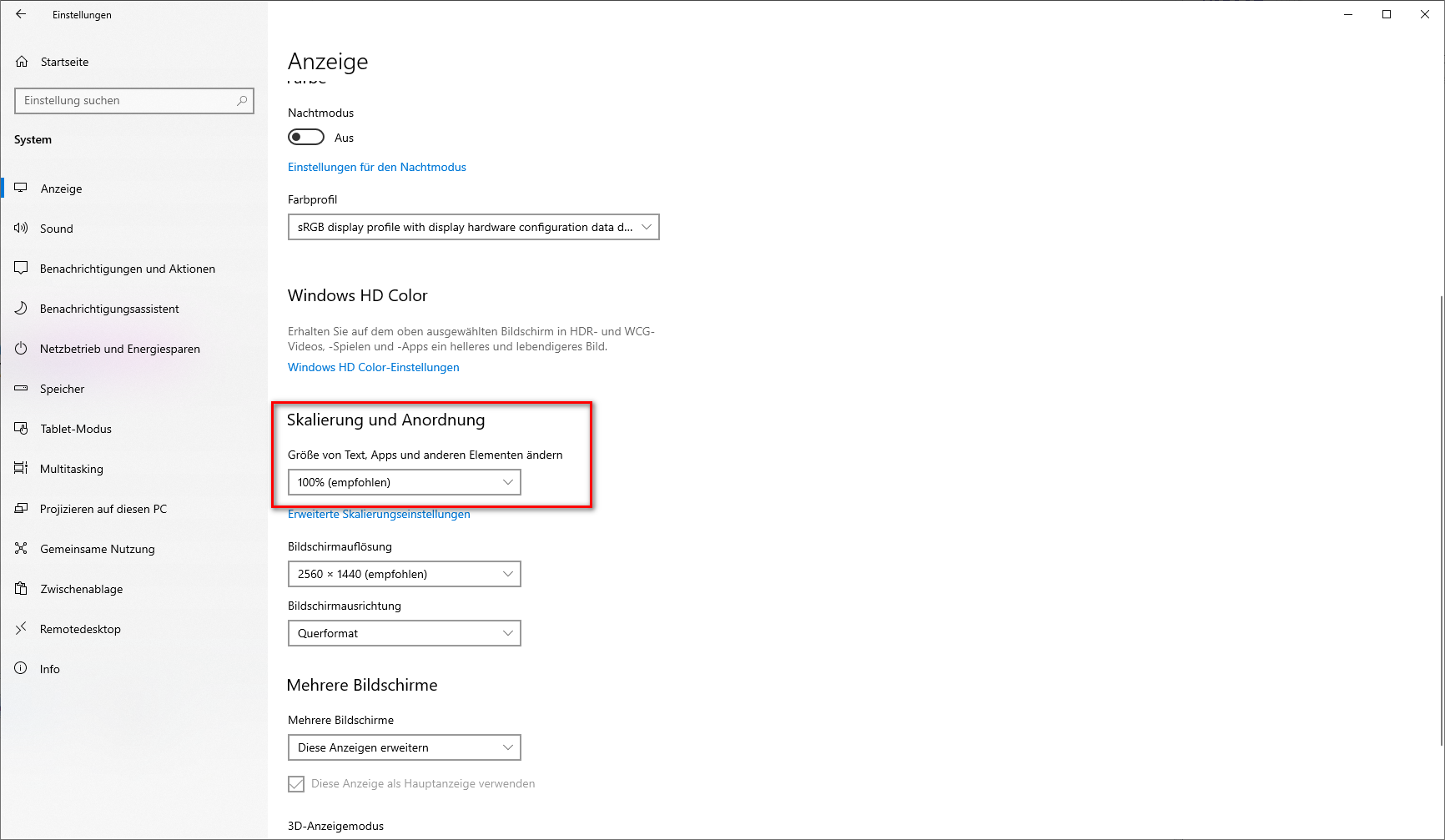 Screenshot of Trados Studio display settings in German with 'Scaling and layout' section highlighted, showing text, apps, and other items at 100% recommended size.