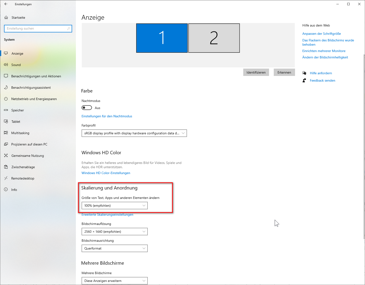 Windows display settings screen with 'Scaling and layout' section highlighted showing text, apps, and other items size set to 100% (recommended).