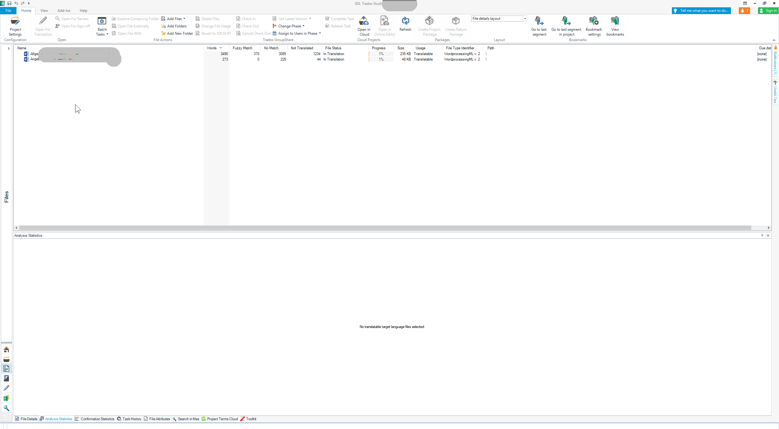 Trados Studio interface on dual ASUS 27 inch screens showing the home tab with no translatable target language files selected.