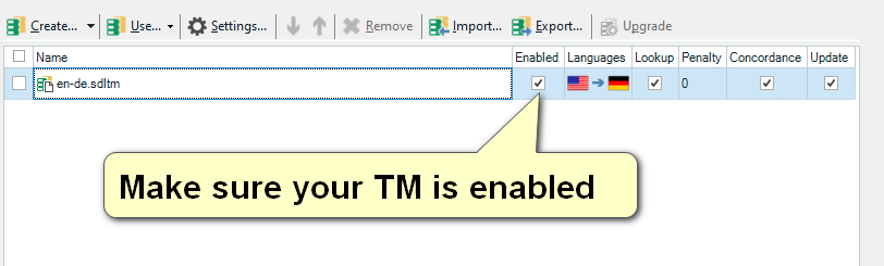 A tooltip in Trados Studio advising to 'Make sure your TM is enabled' pointing to a translation memory with a red exclamation mark.
