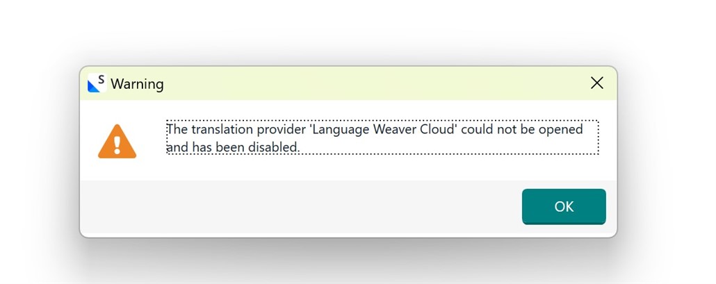 Popup warning message saying 'The translation provider Language Weaver Cloud could not be opened and has been disabled.' with an OK button.