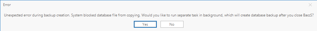 Error message in Trados Studio stating 'Unexpected error during backup creation. System blocked database file from copying.' with options to run a separate task in the background.