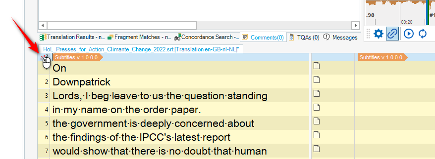 Trados Studio editor view with a red arrow pointing to the 'Select All' button in the toolbar, indicating to click there to select all segments.