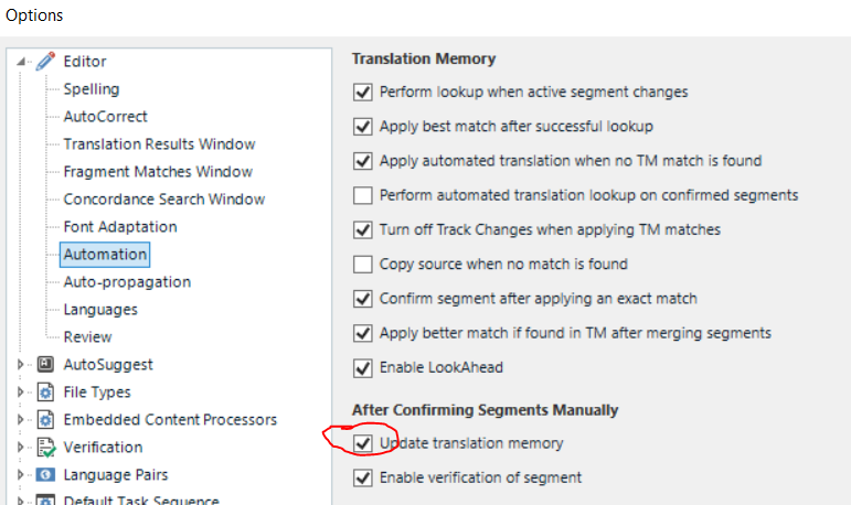 Trados Studio options menu with 'Update translation memory' checkbox checked under 'After Confirming Segments Manually' section.