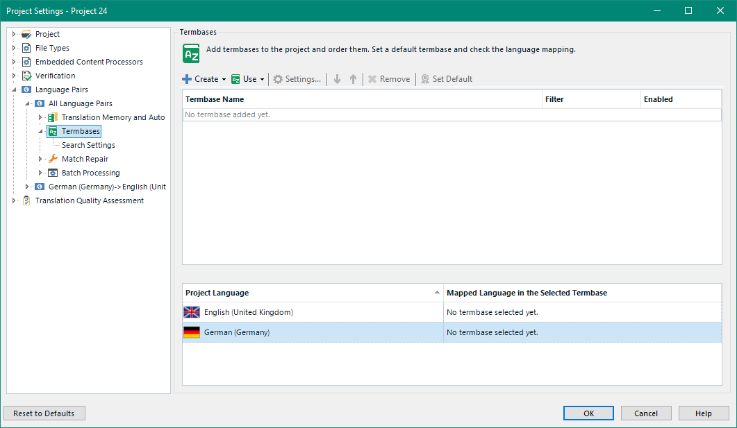 Trados Studio project settings window showing no termbase added yet. Project language set to English (United Kingdom) and German (Germany).