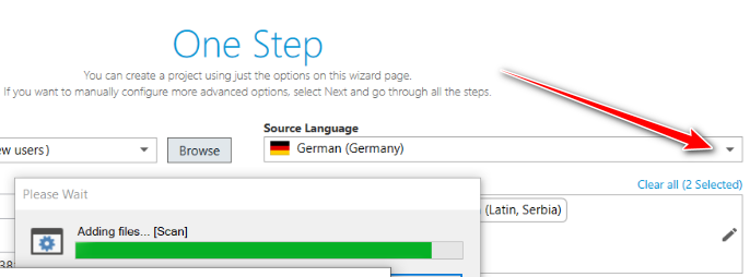 Trados Studio screenshot showing the 'One Step' project creation wizard. The source language is set to German (Germany) with a red arrow pointing to the dropdown menu. A progress bar indicates 'Adding files... Scan' is in process.