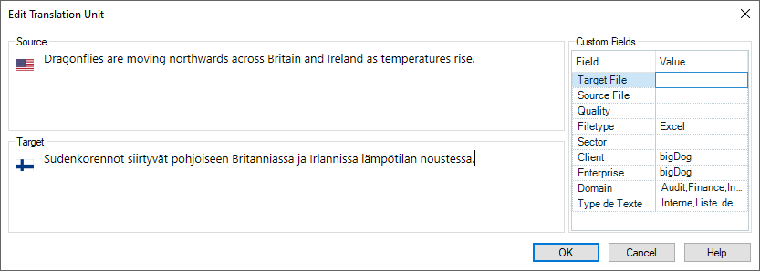 Screenshot of Trados Studio's Edit Translation Unit window, showing source text in English and target text in Finnish, with custom fields for file type and client information.