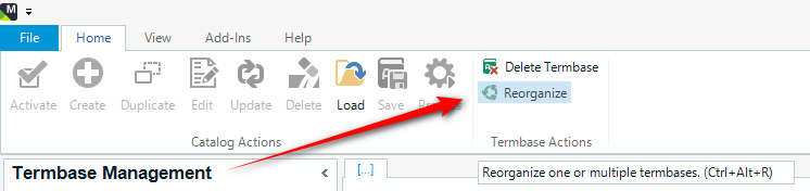 Screenshot of Trados Studio's Termbase Management interface with a red arrow pointing to the 'Reorganize' button.