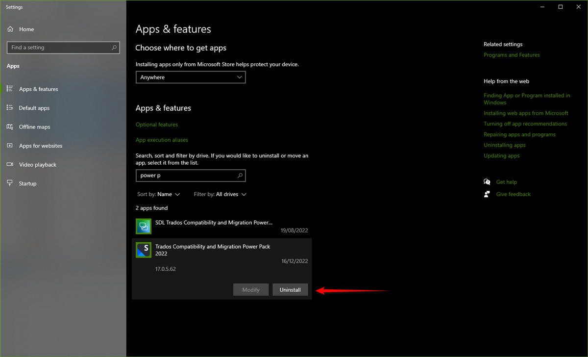 Windows Settings screen showing Apps & features with a search result for 'power p' displaying 'SDL Trados Compatibility and Migration Power Pack' with an option to uninstall highlighted by a red arrow.