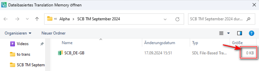 Screenshot of Trados Studio showing an open folder 'SCB TM September 2024' with a file 'SCB DE-GB' highlighted, indicating a file size of 0 KB with a red error arrow.