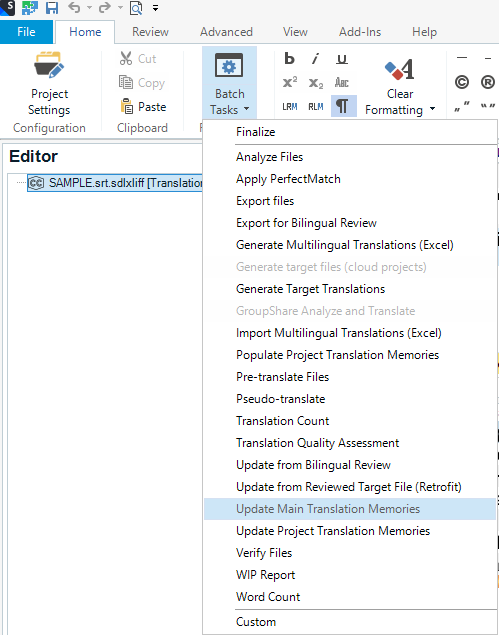 Trados Studio Editor interface showing the 'Batch Tasks' dropdown menu with 'Update Main Translation Memories' option highlighted.