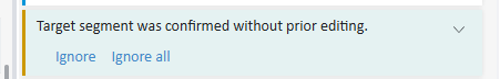 Screenshot showing a warning message 'Target segment was confirmed without prior editing.' with options to 'Ignore' or 'Ignore all'.