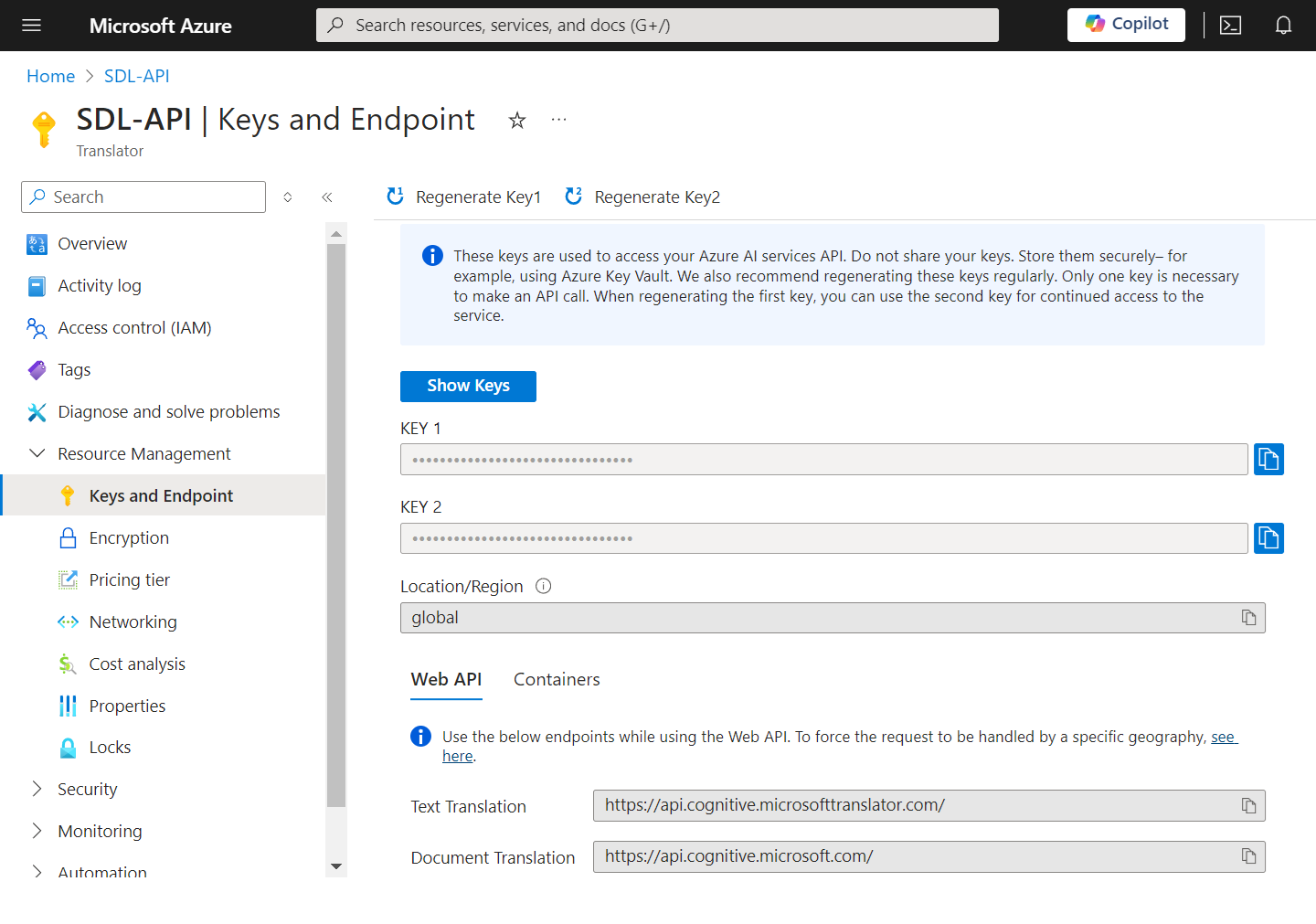 Screenshot of Microsoft Azure portal showing SDL-API keys and endpoint page. Two obscured API keys are visible with a global locationregion. Information on Web API endpoints for text and document translation is provided.