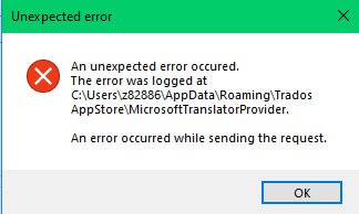 Error message dialog box stating 'An unexpected error occurred. The error was logged at C:UsersredactedAppDataRoamingTradosAppStoreMicrosoftTranslatorProvider. An error occurred while sending the request.' with an 'OK' button.