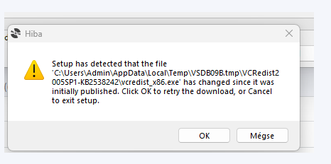 Error message during software setup stating 'Setup has detected that the file C:UsersAdminAppDataLocalTempVSD9B09.tmpVCRedist2005SP1-KB2538242vcredist_x86.exe has changed since it was initially published. Click OK to retry the download, or Cancel to exit setup.' with OK and Megse (Cancel) buttons.