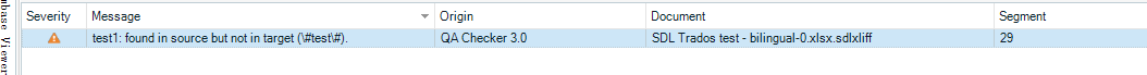 Trados Studio QA Checker warning message indicating 'test1' found in source but not in target (#test#).