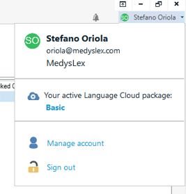 User account dropdown in Trados Studio showing the user's email, company name, and an active 'Basic' Language Cloud package with options to manage account or sign out.