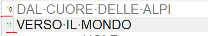 Trados Studio segment view splitting the sentence 'DAL CUORE DELLE ALPI VERSO IL MONDO' into two segments at the soft return.