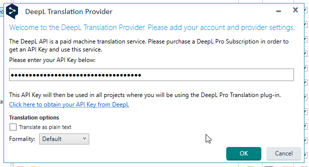 Trados Studio dialog box for DeepL Translation Provider asking to enter API Key with an 'OK' button at the bottom.