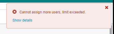 Error message in Trados Studio stating 'Cannot assign more users, limit exceeded' with a 'Show details' option.