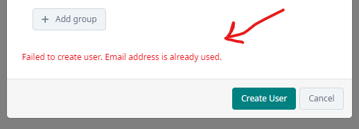 Screenshot showing an error message 'Failed to create user. Email address is already used.' with a red arrow pointing to it. Below are buttons for 'Create User' and 'Cancel'.