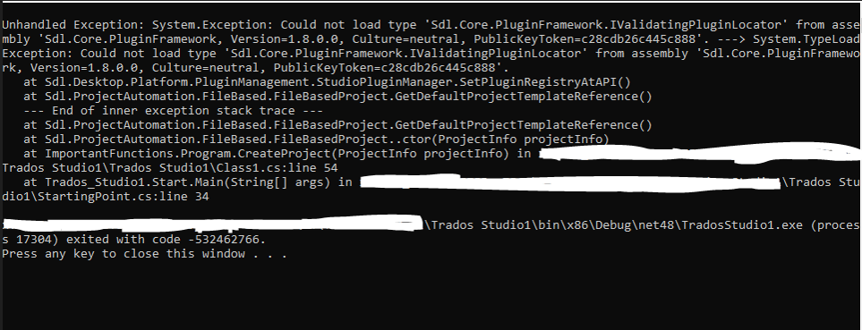 Error message in Visual Studio output window showing 'System.Exception: Could not load type Sdl.Core.PluginFramework.IValidatingPluginLocator' and 'exited with code -532462766'.