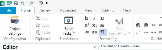 Screenshot of Trados Studio Editor view with Home tab active, showing options like Cut, Copy, Paste, and Batch Tasks.