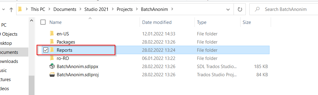 File Explorer window with a Trados Studio project folder open, showing the Reports folder selected.