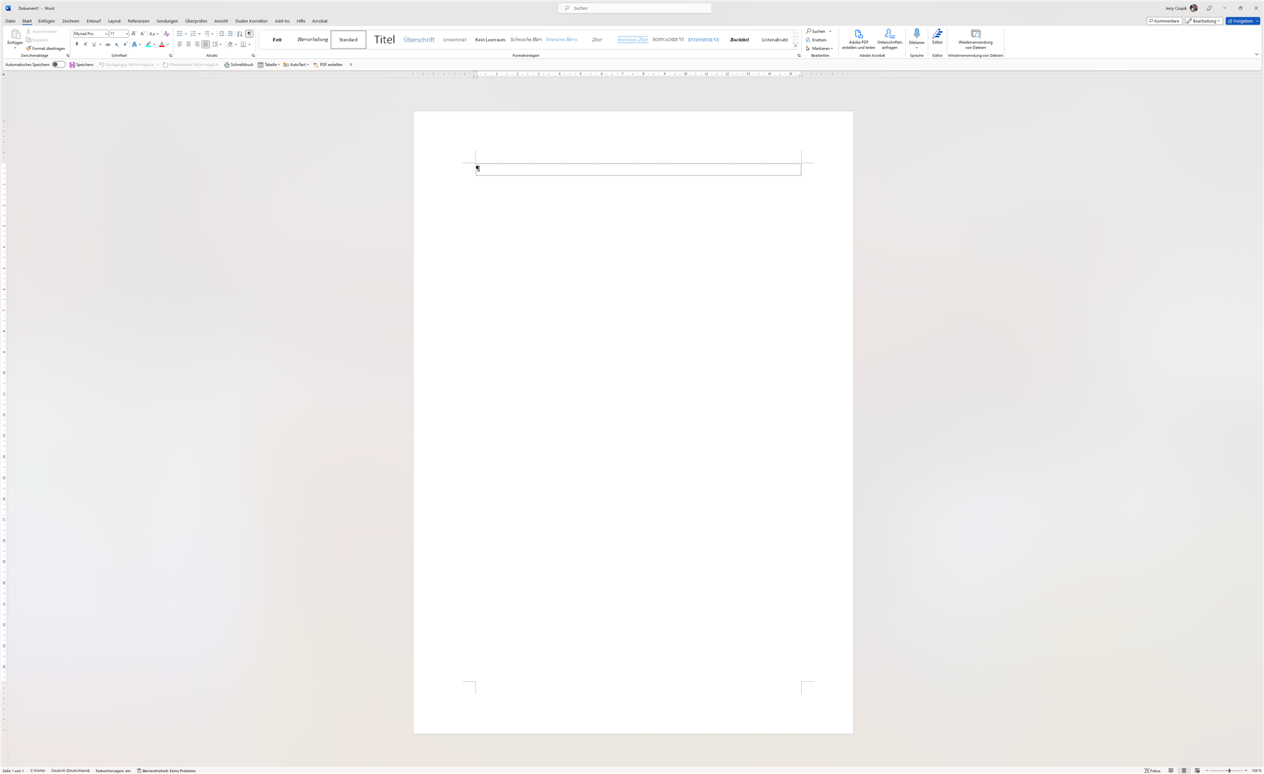 Screenshot of Microsoft Word with a blank document and a cursor at the beginning of the page.
