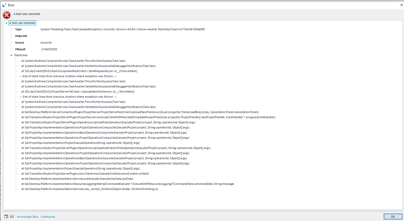 Error dialog box with a red cross icon and the message 'A task was canceled.' Stack trace details are displayed below, referencing System.Threading.Tasks.TaskCanceledException and other methods.