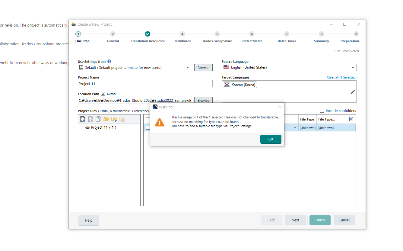 Trados Studio screenshot with a warning message 'The file usage of 1 of the 1 selected files was not changed to translatable because no matching file type could be found. You have to add a suitable file type via Project Settings.'