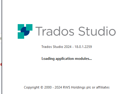 Trados Studio 2024 splash screen with version number 18.0.1.2259, showing a loading message 'Loading application modules...' with a visible error indicator on the bottom left.