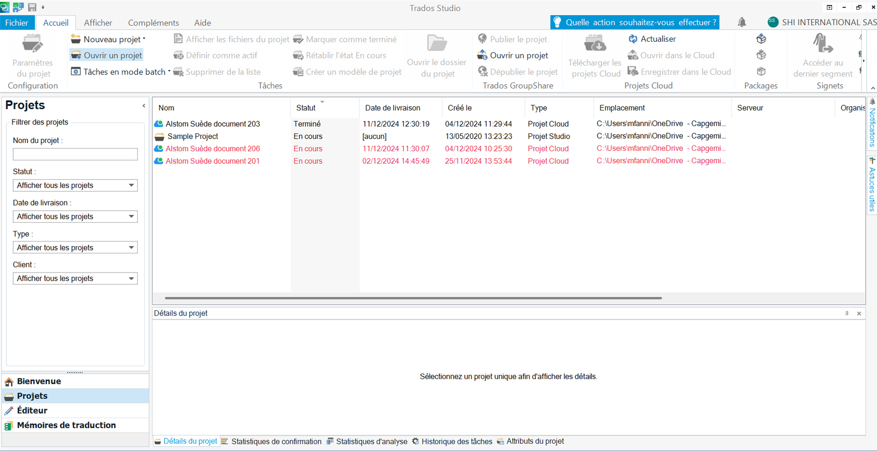 Trados Studio interface showing a list of projects with their statuses, delivery dates, and types. Some projects are marked as 'En cours' in red.