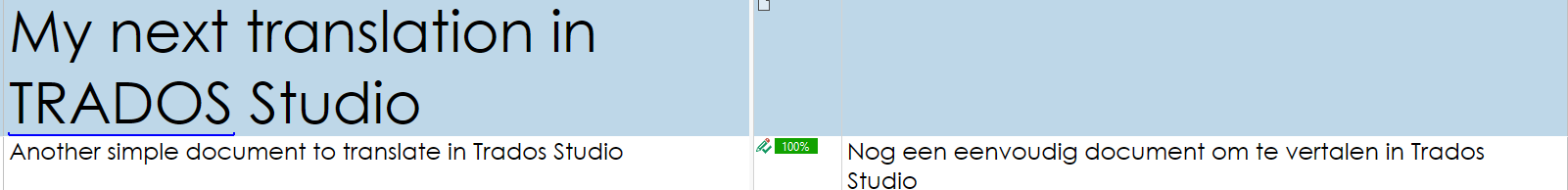 Close-up of Trados Studio interface with a segment translated at 100% and a partial view of another segment.