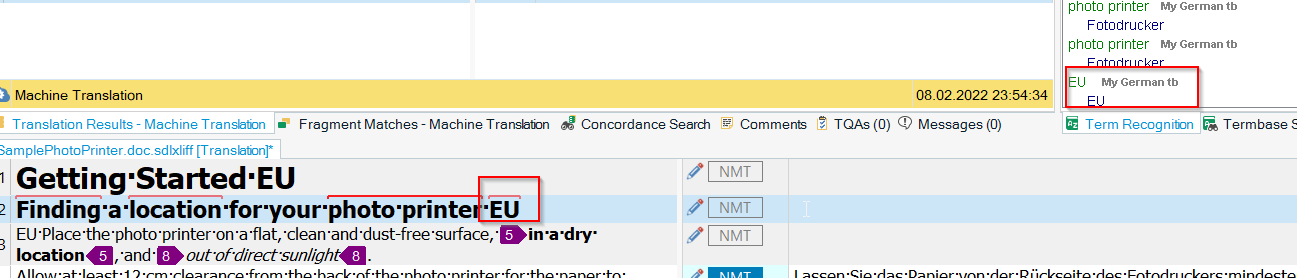 Trados Studio translation segment with the term 'EU' highlighted, indicating successful recognition in the text 'Finding a location for your photo printer EU'.