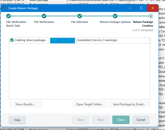Trados Studio dialog box showing 'Create Return Package' process with 'Creating return package...' message and a green checkmark indicating completion without errors or warnings.