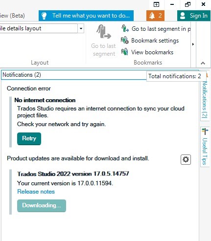 Trados Studio notification window showing 'No internet connection' error and a product update available for download.