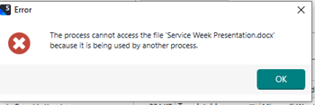 Error dialog box stating 'The process cannot access the file 'Service Week Presentation.docx' because it is being used by another process.' with an OK button.