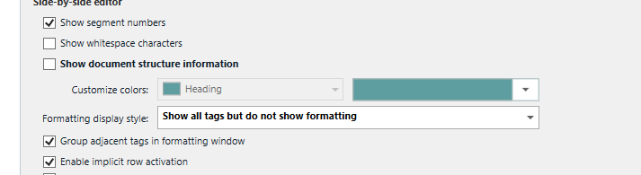 Screenshot of Trados Studio 2022 settings with 'Show all tags but do not show formatting' selected, indicating the user's attempt to fix the cursor issue.