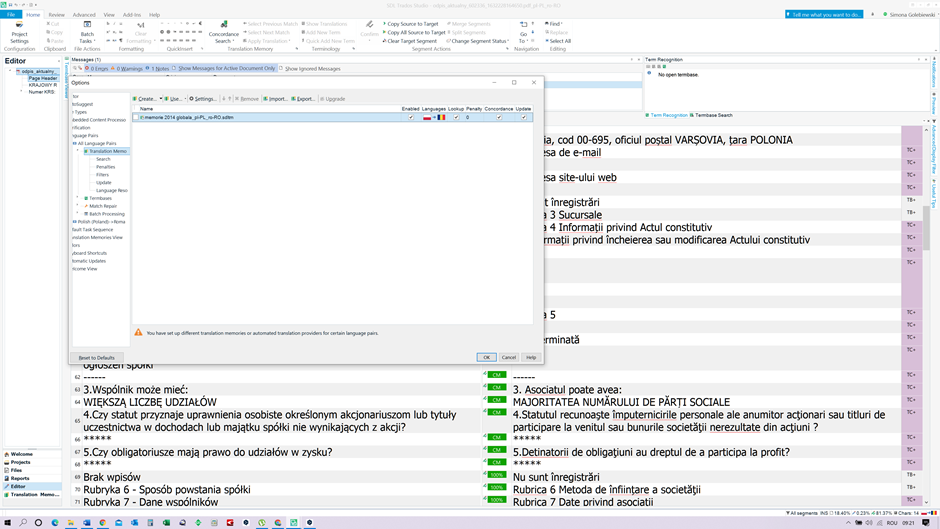 Trados Studio screenshot with Options dialog open, displaying a warning about different translation providers for language pairs.