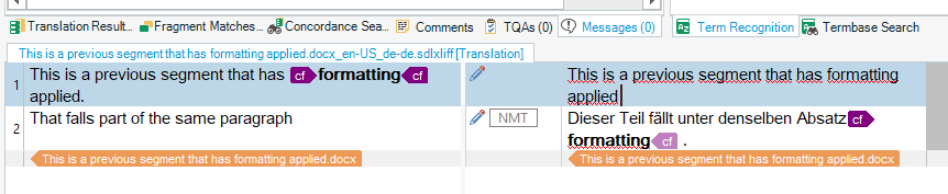 Trados Studio interface showing two translation segments with formatting tags applied, one in English and its corresponding translation in German.
