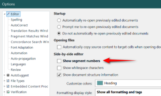 Trados Studio options menu with 'Show segment numbers' highlighted by a red arrow, under the 'Editor' section.
