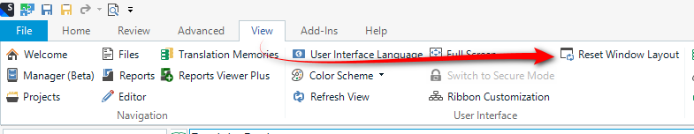 Trados Studio screenshot showing the View menu with an arrow pointing to the 'Reset Window Layout' option.