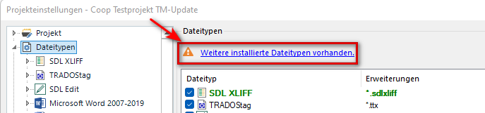 Trados Studio screenshot showing the 'File Types' section with a warning message in German indicating more installed file types are available.