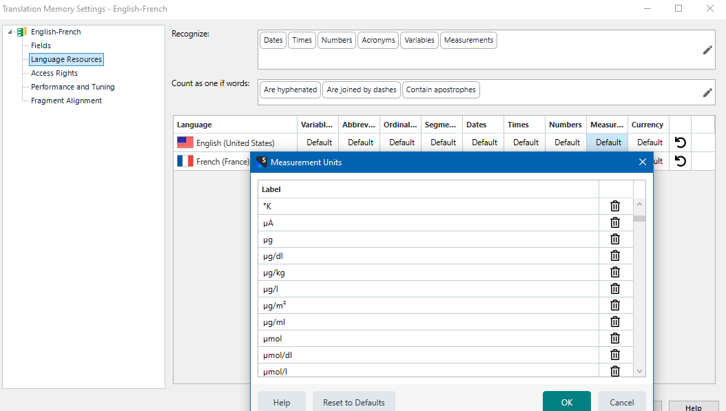 Trados Studio Translation Memory Settings window showing English-French language pair with Measurement Units tab selected. List of measurement units includes ' m' among others like ' A' and ' g'. No visible errors or warnings.