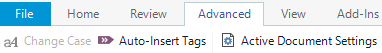 Trados Studio interface showing the Advanced ribbon with the 'Auto-Insert Tags' button highlighted.