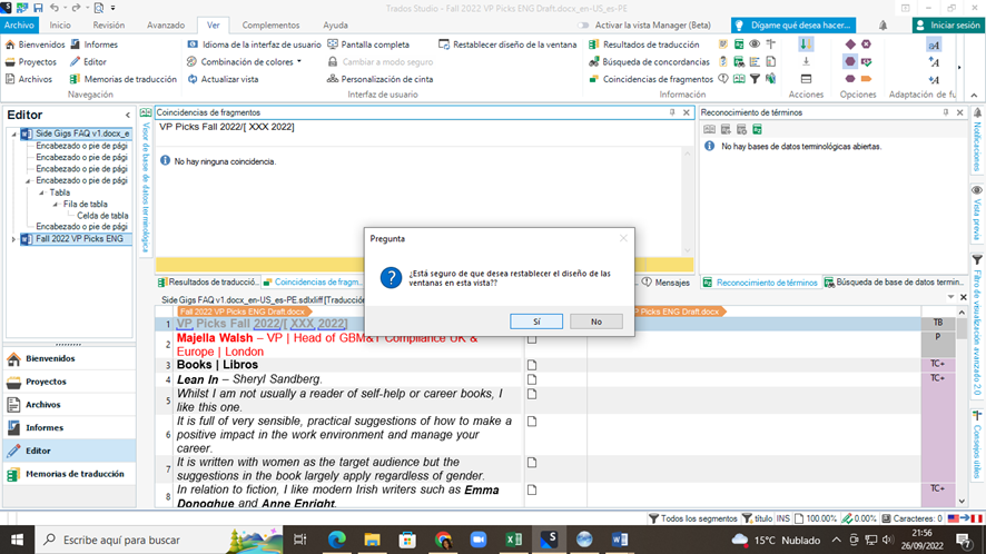 Trados Studio editor window with a pop-up message asking to reset the window layout, with no search results for terminology databases.
