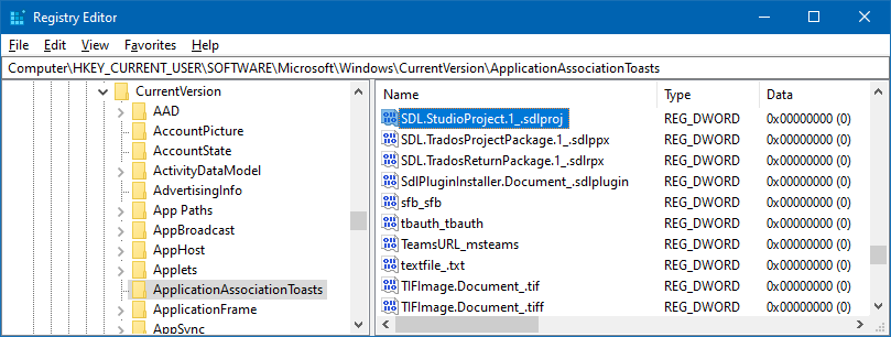 Screenshot of Registry Editor with HKEY_CURRENT_USER path, highlighting SDL extensions related to Trados Studio with zero values in the Data column.