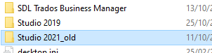 File explorer window showing a list of folders including SDL Trados Business Manager, Studio 2019, and a renamed folder Studio 2021_old indicating a previous version.