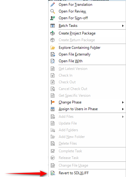 Trados Studio screenshot displaying right-click context menu with an arrow pointing to 'Revert to SDLXLIFF' option.